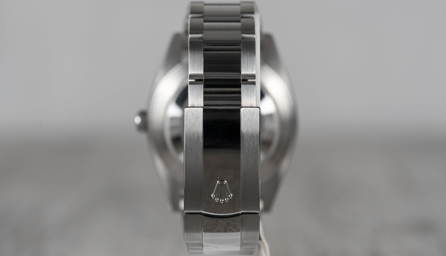 Rolex Date-just 41mm in White Roman Dial with Smooth Bezel 126300