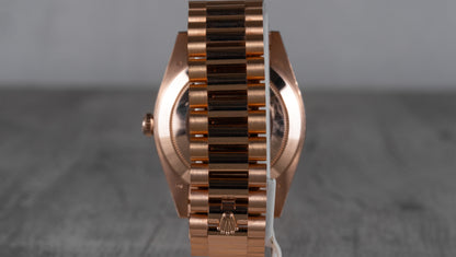 Rolex Oyster Perpetual Day-Date Rose Gold with Sundust Dial 228235