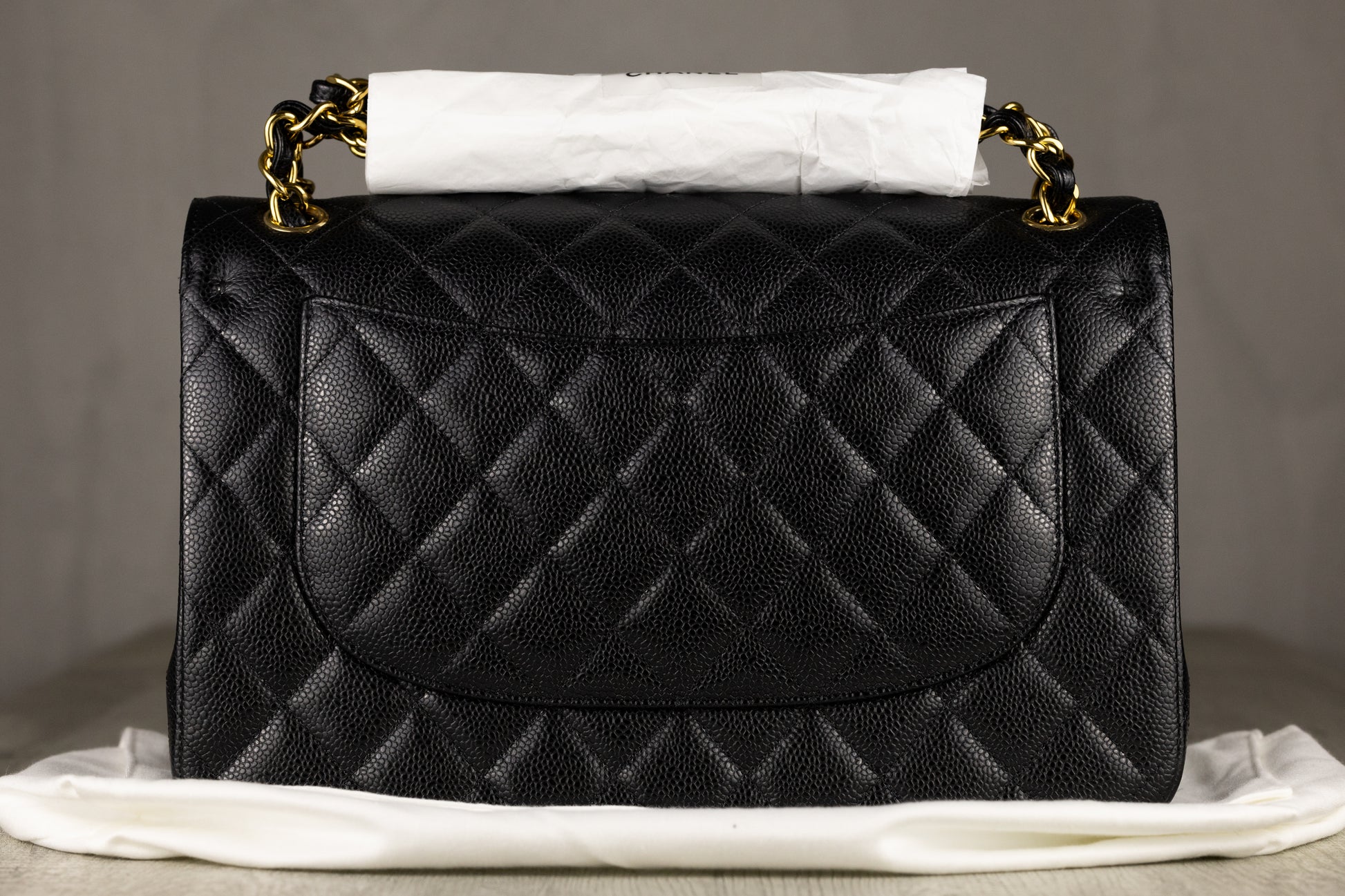 Chanel A58600 Y01864 C3906 Jumbo Classic Double Flap Bag in Black Quilted Caviar Leather with Gold-Tone Hardware