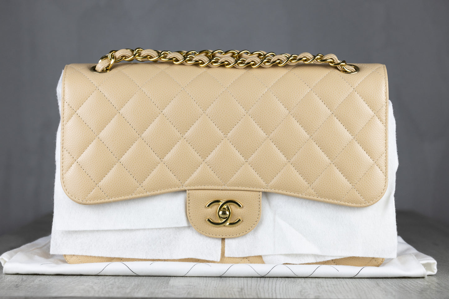 Chanel A58600 Y01864 Jumbo Classic Double Flap Bag in Beige Quilted Caviar Leather with Gold-Tone Hardware