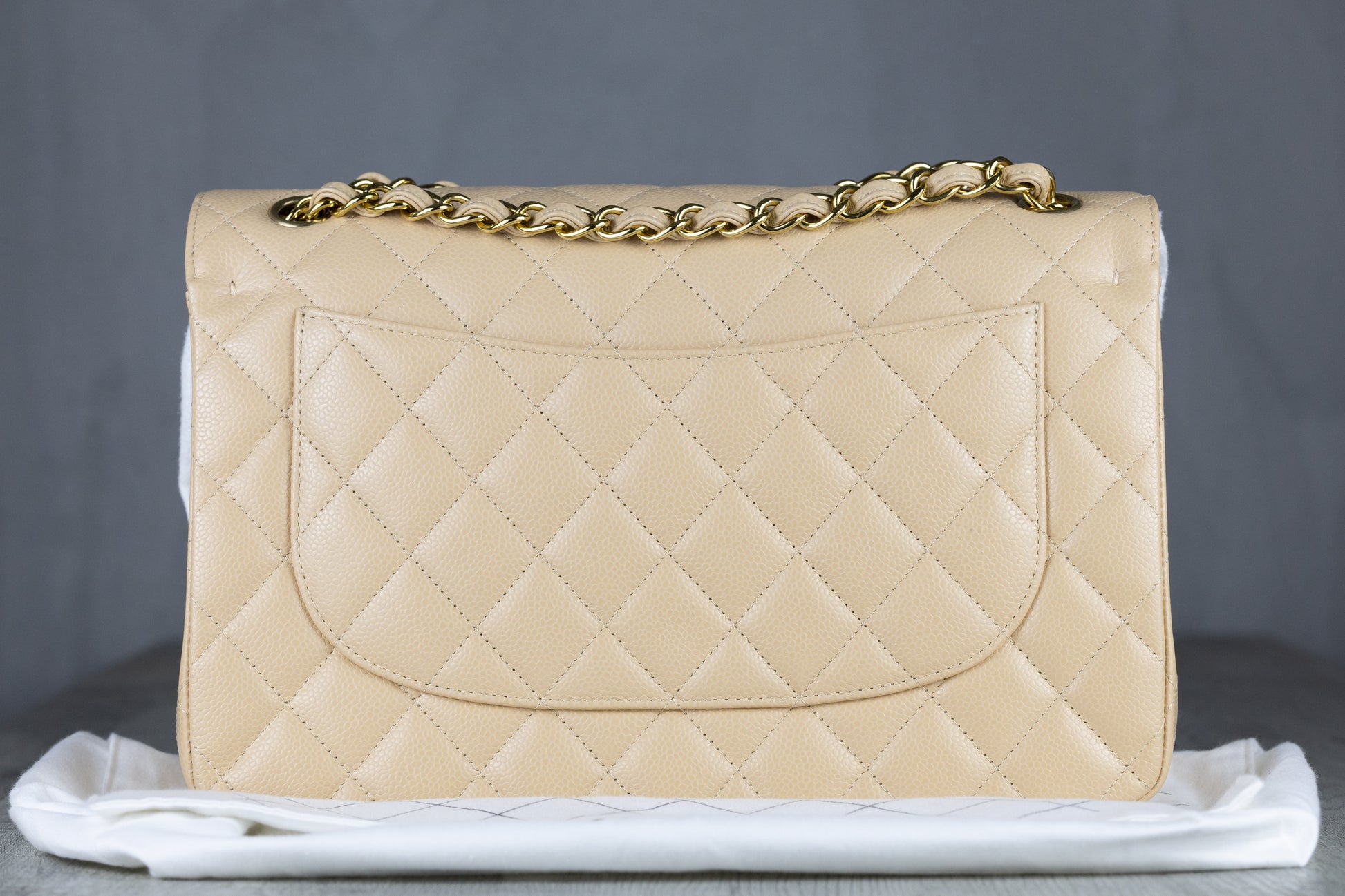 Chanel A58600 Y01864 Jumbo Classic Double Flap Bag in Beige Quilted Caviar Leather with Gold-Tone Hardware