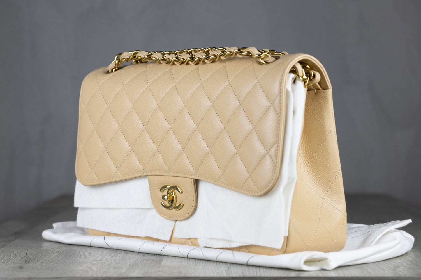 Chanel A58600 Y01864 Jumbo Classic Double Flap Bag in Beige Quilted Caviar Leather with Gold-Tone Hardware