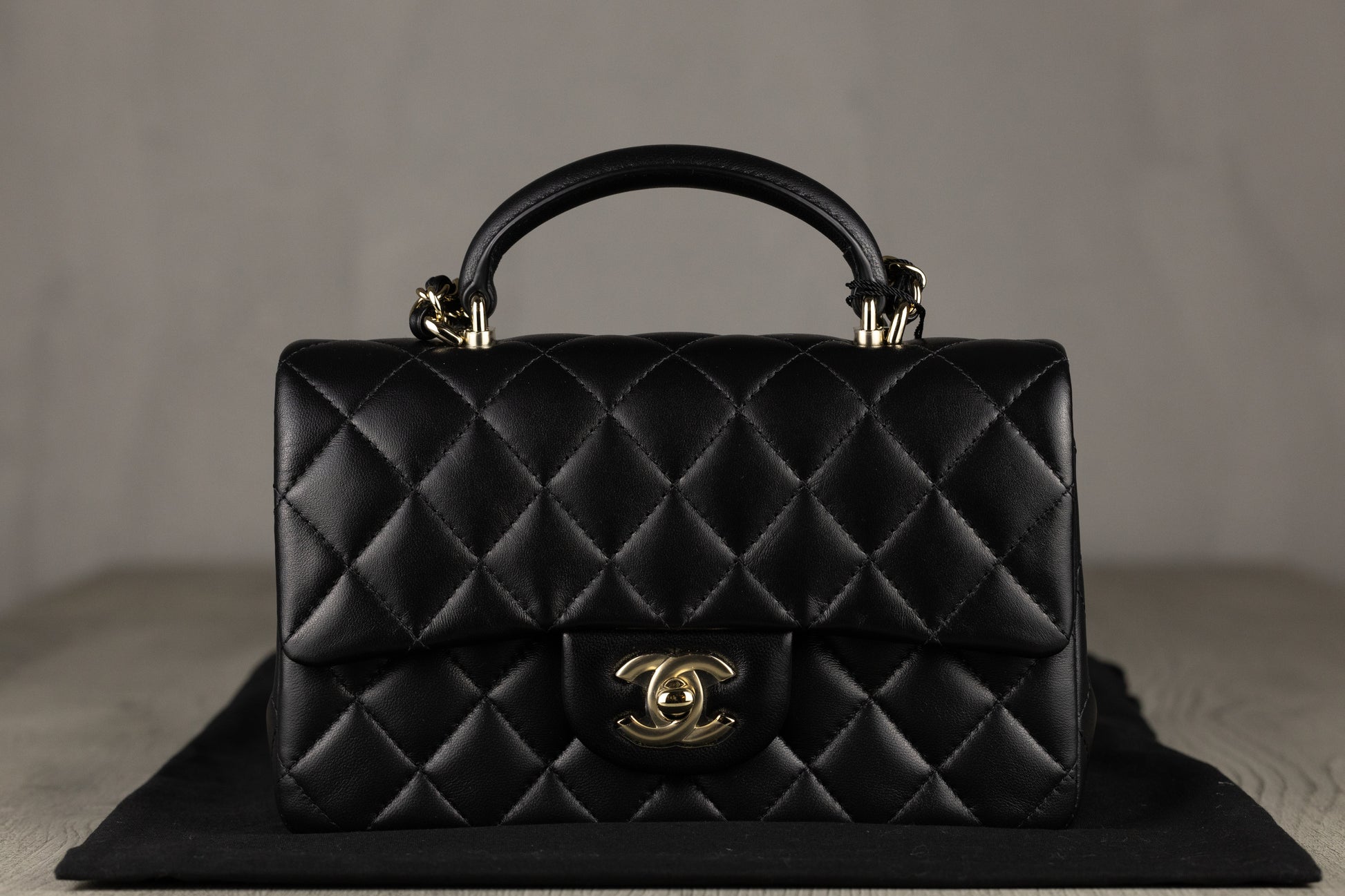 Chanel AS2431 B06660 94305 Mini Coco Flap Bag with Top Handle in Black Quilted Lambskin Leather & Gold-Tone Hardware