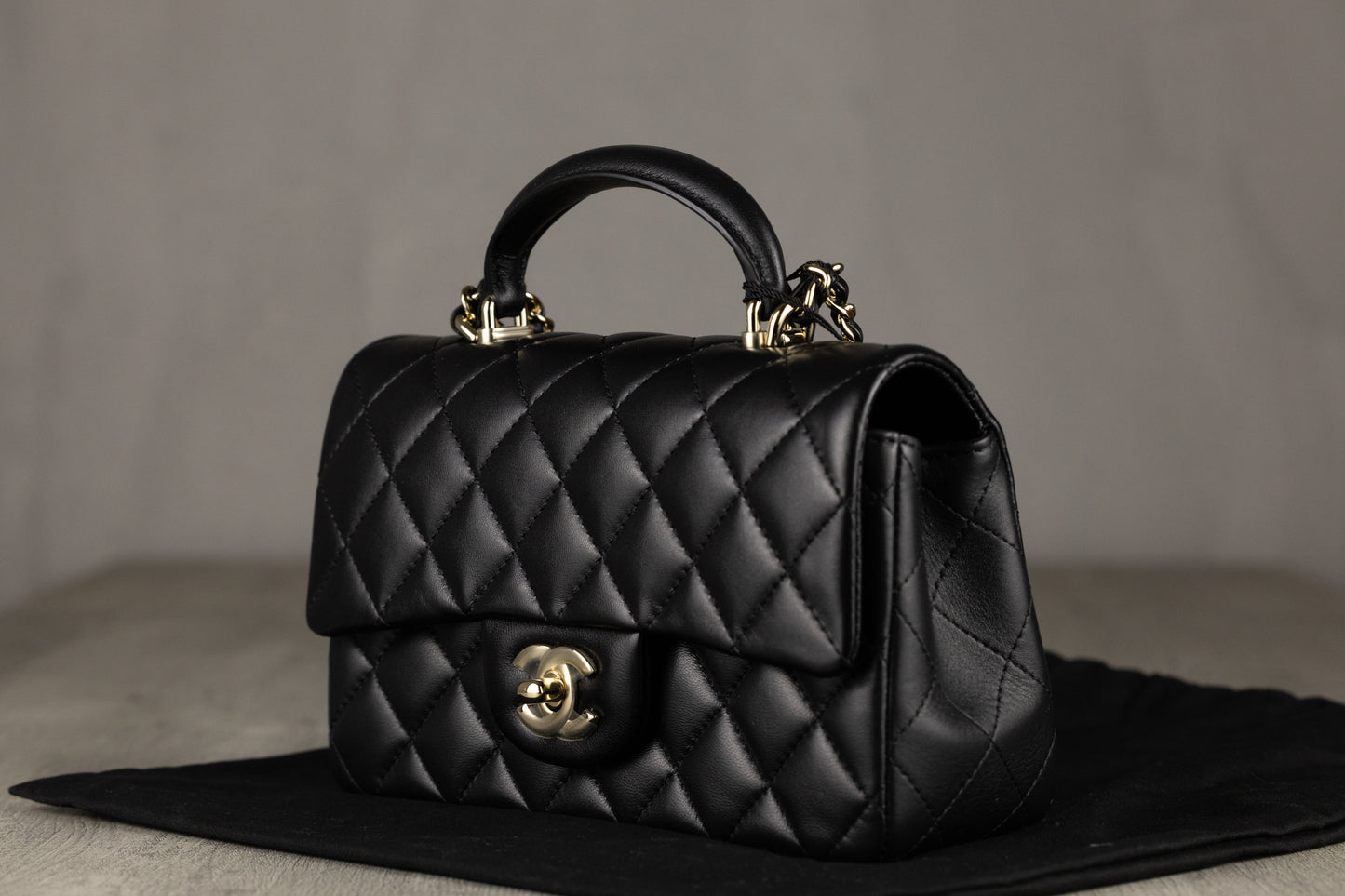 Chanel AS2431 B06660 94305 Mini Coco Flap Bag with Top Handle in Black Quilted Lambskin Leather & Gold-Tone Hardware