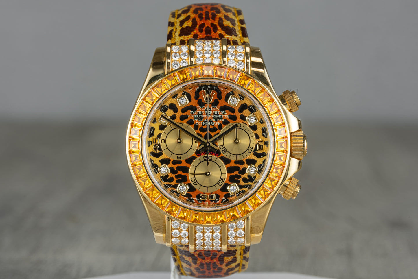 Rolex Daytona Yellow Gold 'Leopard' Diamond Dial Cognac Sapphire Bezel 116598SACO